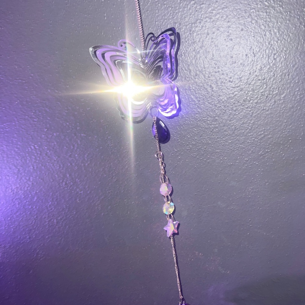 Butterfly wind spinning suncatcher